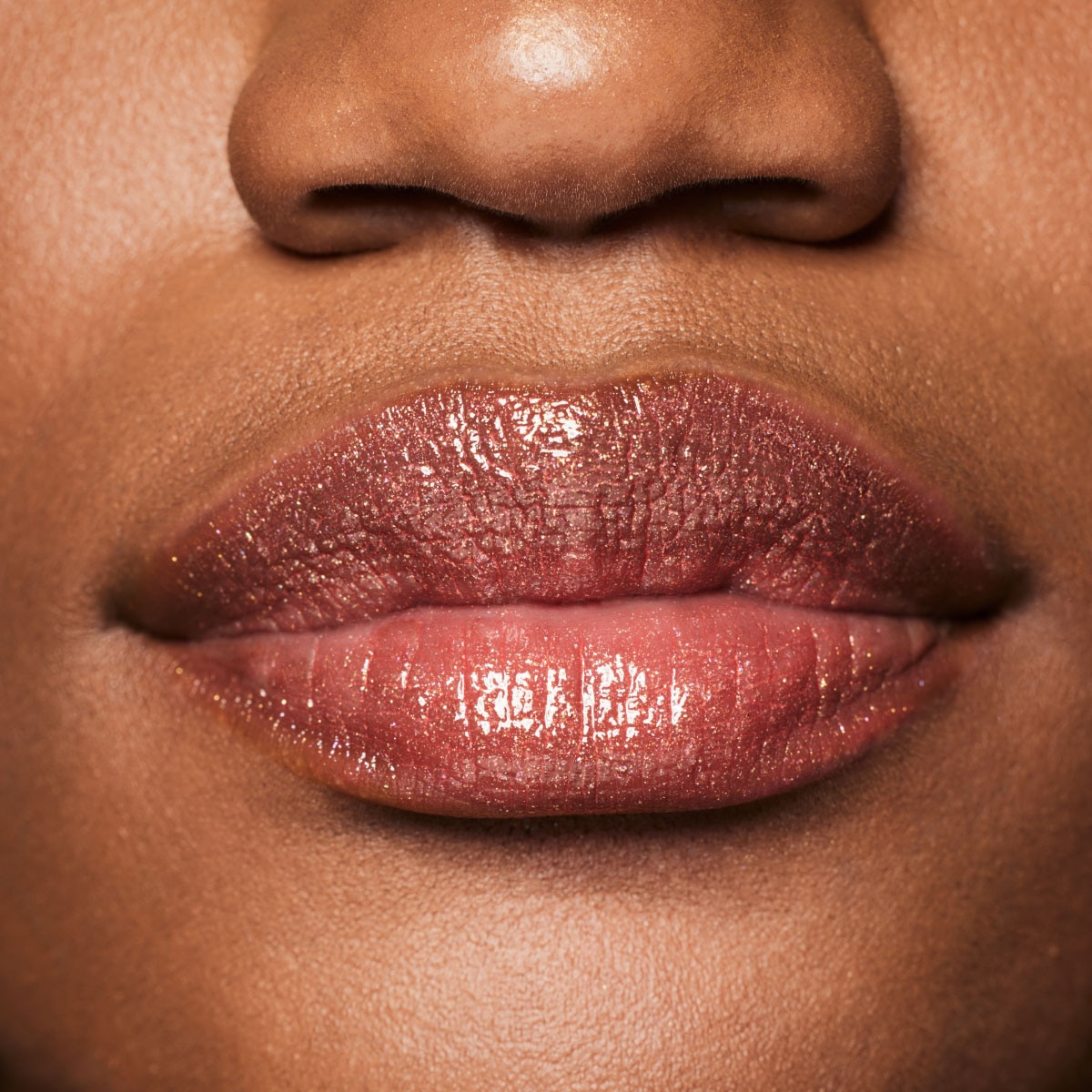 GLOSS BOMB STIX SHIMMER (LABIAL CON ACABADO BRILLOSO)